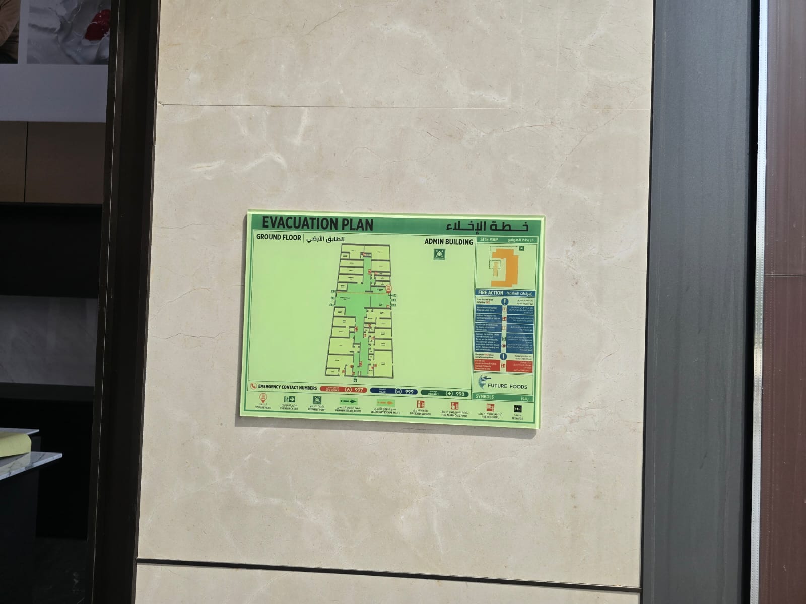 Reverse Printing Type evacuation plan pasted on wall with tape