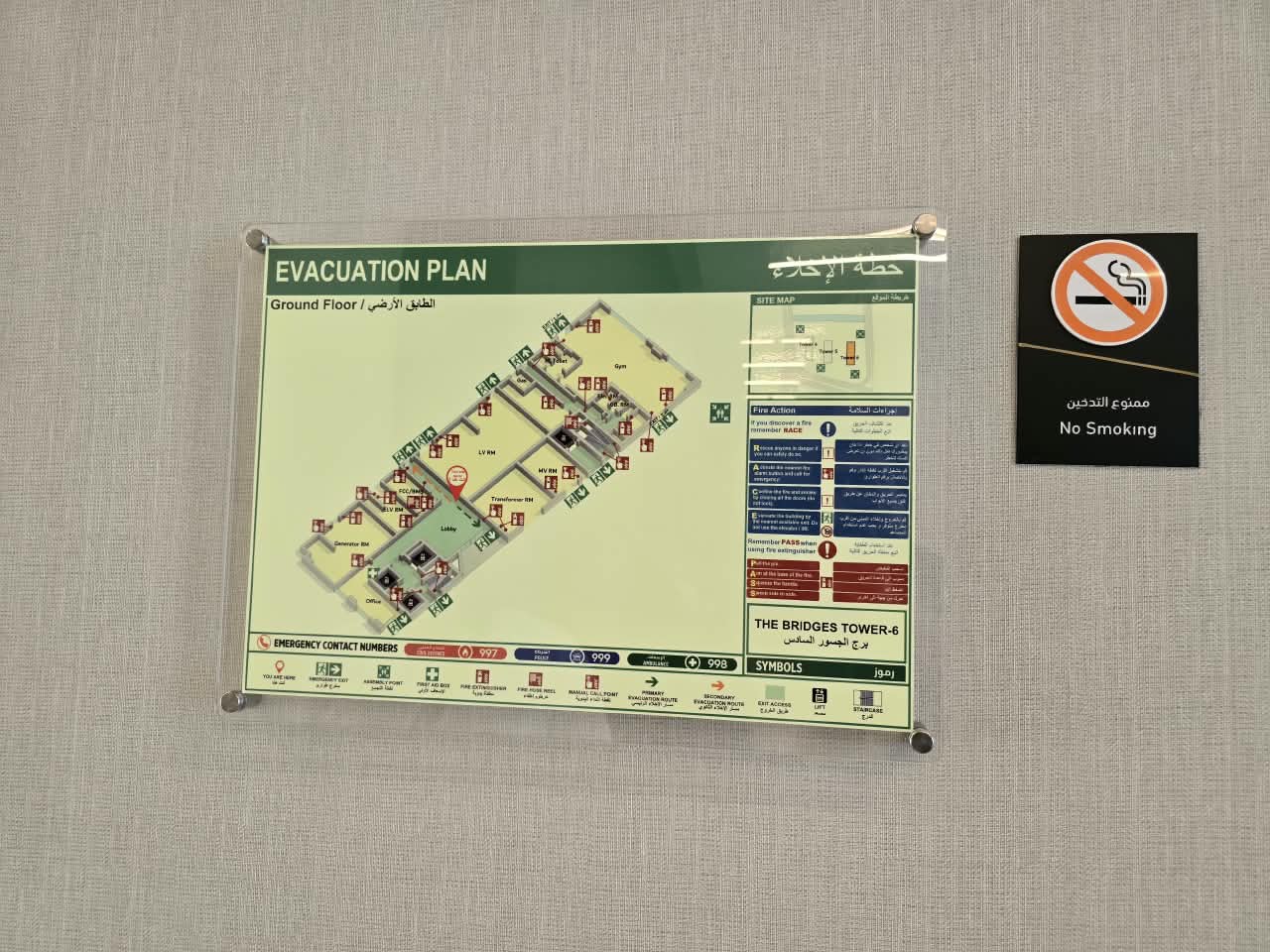 Emergency evacuation plan and no-smoking signage at The Bridges Tower 6, Al Reem Island